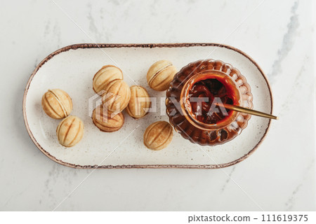 Homemade walnut shaped cookies with boiled condensed milk 111619375