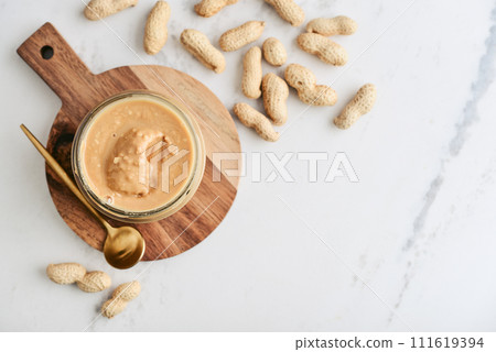 Creamy and smooth peanut butter in jar Creamy and smooth peanut butter in jar 111619394