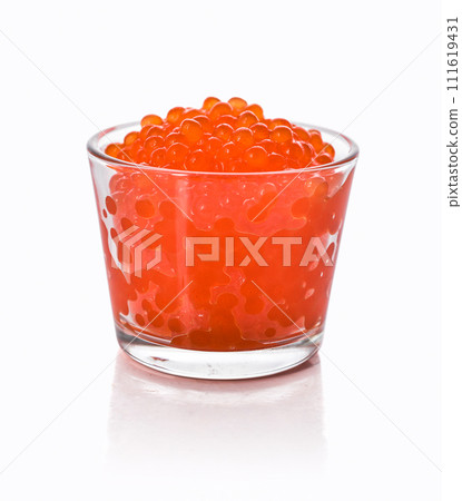 Glass of red trout caviar 111619431