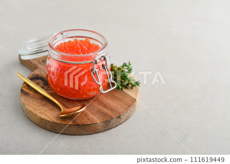 Red caviar in the glass jar 111619449