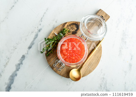 Red caviar in the glass jar Red caviar in the glass jar 111619459