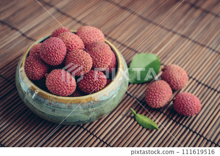 Fresh organic lychee fruit in bowl Fresh organic lychee fruit in bowl 111619516