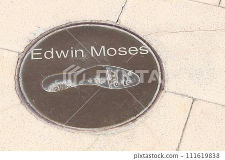 Footprint of Edwin Moses near of the Olympic Stadium in Montjuic, Barcelona. Edwin Moses is an American former track and field athlete in the 400 m hurdles 111619838