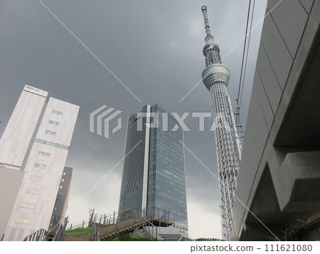 Skytree visible in the cloudy sky of the city Skytree visible in the cloudy sky of the city 111621080