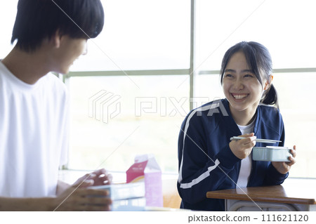Students eating lunch in the classroom 111621120