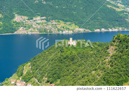 Mountain landscape, picturesque mountain lake in the summer morning, large panorama. Iseo, Italy 111622657