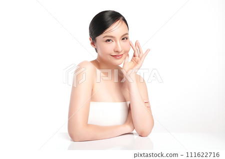 Beautiful young asian woman with clean fresh skin on white background, Face care, Facial treatment, Cosmetology, beauty and spa, Asian women portrait. Beautiful young asian woman with clean fresh skin on white background, Face care, Facial treatment, Cosmetology, beauty and spa, Asian women portrait. 111622716