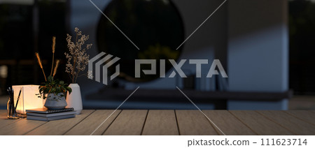 A space for showcasing your product on a wooden table with decor in a dark room at night. A space for showcasing your product on a wooden table with decor in a dark room at night. 111623714