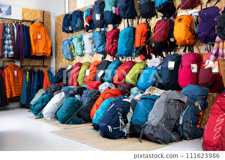 On vertical showcase- trekking shoes for climbing and hiking, colorful ropes and ropes for climbing On vertical showcase- trekking shoes for climbing and hiking, colorful ropes and ropes for climbing 111623986