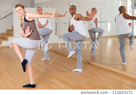 Happy adults training swing steps at class 111624172