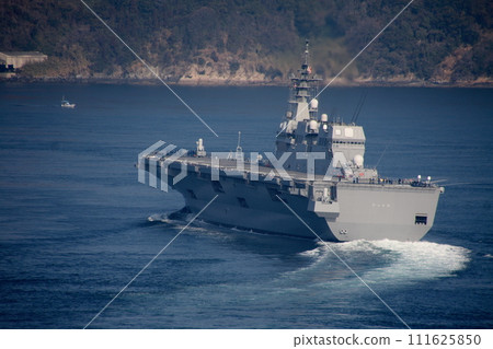 Helicopter-equipped destroyer Hyuuga passing through the Kurushima Kaikyo Bridge Helicopter-equipped destroyer Hyuuga passing through the Kurushima Kaikyo Bridge 111625850