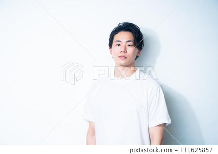 Man in white T-shirt, white background Man in white T-shirt, white background 111625852