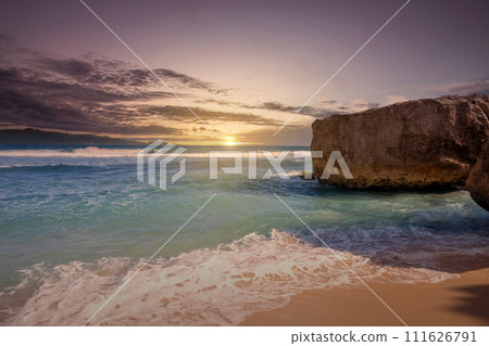 Sandy beach with the blue ocean and sunset scene Sandy beach with the blue ocean and sunset scene 111626791