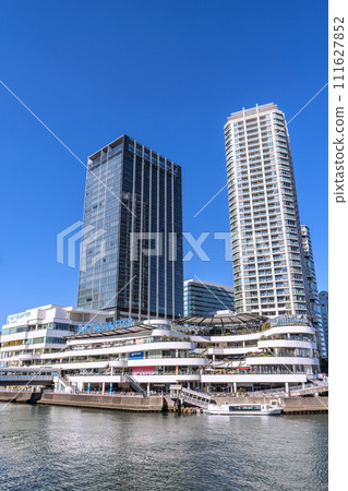 Yokohama cityscape in Japan, overlooking the Yokohama Bay Quarter and water buses 111627852