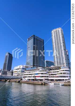 Yokohama cityscape in Japan, overlooking the Yokohama Bay Quarter and water buses Yokohama cityscape in Japan, overlooking the Yokohama Bay Quarter and water buses 111627853