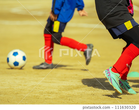 players playing soccer 111630320
