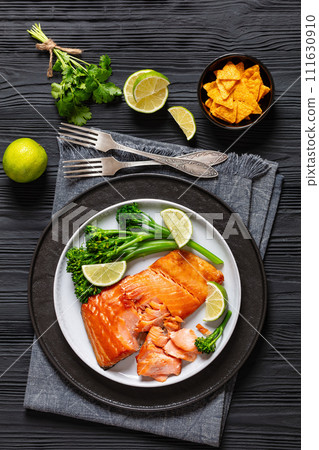 hot smoked salmon with cooked broccoli and lime hot smoked salmon with cooked broccoli and lime 111630910