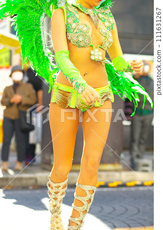 Brazilian costumes dancing samba on the streets of the city Brazilian costumes dancing samba on the streets of the city 111631267