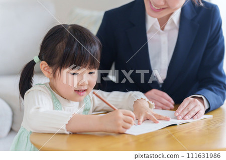 A private tutor who teaches children 111631986