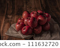 Bright red apple 111632720
