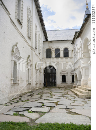 Courtyard with buildings of medieval monastery of 17th century in the Kremlin in Rostov the Great 111632874
