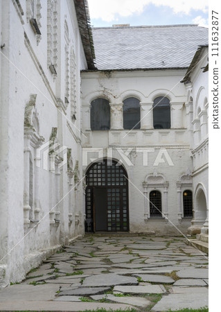 Courtyard with buildings of medieval monastery of 17th century in the Kremlin in Rostov the Great 111632877
