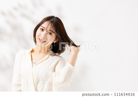 Young woman beauty 20s hair care 111634916