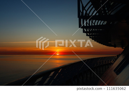 Magical sunset over the Gulf of Finland, Baltic sea. View from the ship 111635062