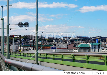 Mt. Fuji in winter from the top of the Tama Suidobashi Bridge over the Tama River Mt. Fuji in winter from the top of the Tama Suidobashi Bridge over the Tama River 111635311