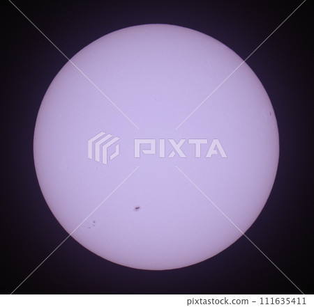 Small sunspots visible on the surface of the sun 111635411