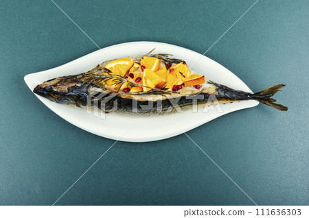Roasted mackerel fish with oranges. Roasted mackerel fish with oranges. 111636303