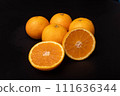 Fresh oranges on black background 111636344