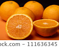Orange cut in half 111636345