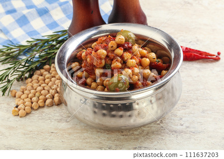 Chickpea beans with dry tomato and olives Chickpea beans with dry tomato and olives 111637203