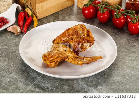 Tasty roasted chicken wing with spices Tasty roasted chicken wing with spices 111637318