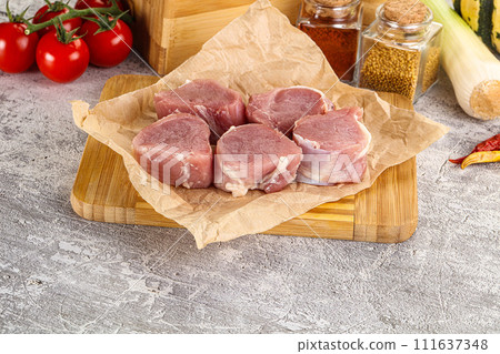 Uncooked raw pork tenderloin medallions 111637348