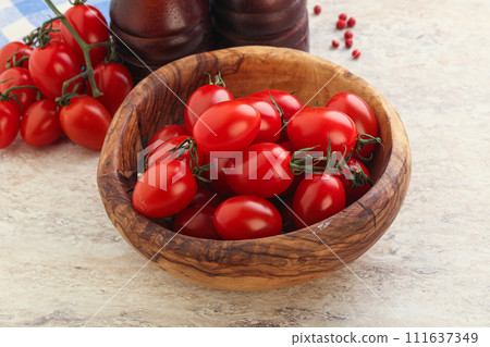 Red bright sweet cherry tomato 111637349