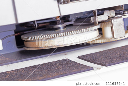 Part of a broken metal typewriter, vintage object 111637641