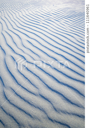 Wind print on sandy beach Wind print on sandy beach 111640961