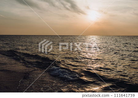 beautiful evening landscape on the sea. sunset of the setting sun. the sun disappeared behind the horizon of the sea.Turkey Mediterranean Sea beautiful evening landscape on the sea. sunset of the setting sun. the sun disappeared behind the horizon of the sea.Turkey Mediterranean Sea 111641739