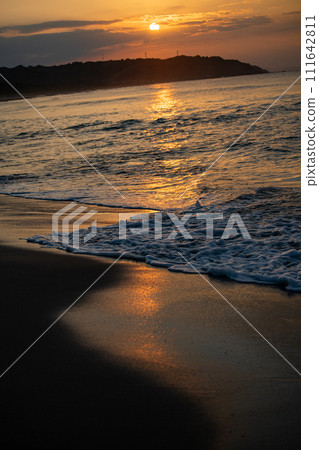 Sunset over the sea 111642811