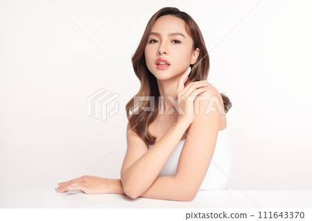 Beautiful young asian woman with clean fresh skin on white background, Face care, Facial treatment, Cosmetology, beauty and spa, Asian women portrait. Beautiful young asian woman with clean fresh skin on white background, Face care, Facial treatment, Cosmetology, beauty and spa, Asian women portrait. 111643370