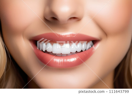 Close-Up of a Womans Mouth With White Teeth 111643799