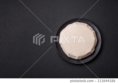 Delicious fresh white young cheese from cow's or sheep's milk Delicious fresh white young cheese from cow's or sheep's milk 111644188