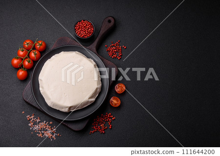 Delicious fresh white young cheese from cow's or sheep's milk 111644200