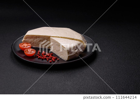 Delicious fresh white young cheese from cow's or sheep's milk Delicious fresh white young cheese from cow's or sheep's milk 111644214