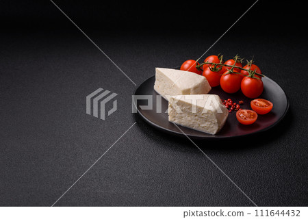 Delicious fresh white young cheese from cow's or sheep's milk 111644432