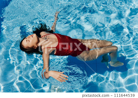 Girl pool female lifestyle sport person swim blue underwater summer water 111644539