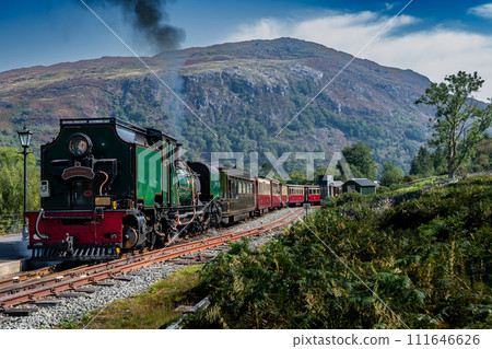 Old Train With Steam Locomotive At Beddgelert Train Station In Snowdonia National Park In Wales, United Kingdom 111646626