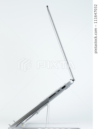 Laptop side profile on stand Laptop side profile on stand 111647032